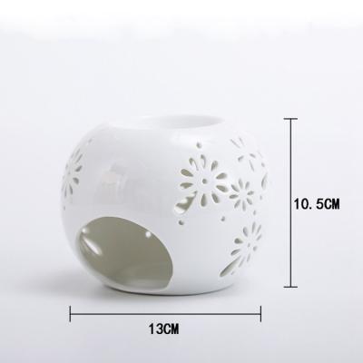 China Ceramic Censer Burners Essential Fragrance Wax Cast Iron Heaters White Ceramic Round Oil Burner for sale