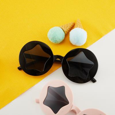 China High quality new children's sunglasses cartoon star pentagon glasses shape party candy color sunglasses doll glasses for sale