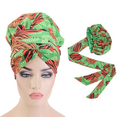 China New Soft Smooth African Print Satin Flame Round Feeling Hat Women Fashion Multicolor Turban Hat Scarf Hat for sale