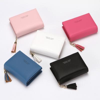 China Waterproof Ladies Short Simple Zipper Multi-card Slot Wallet Fashion Ladies Wallet With Tassel for sale