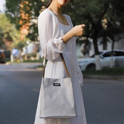 China High quality fashion style girl handbag large capacity polyester shoulder bag simple reusable shopping bag PORTABLE for sale