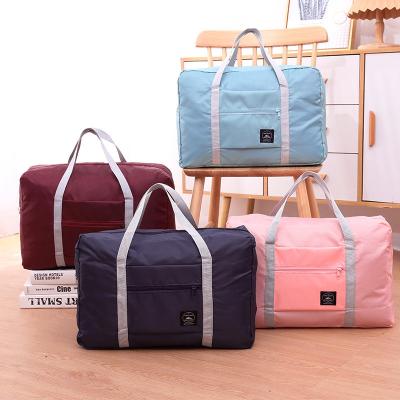 China Duffle Bag Light Business Travel Storage Durable Large Capacity Handheld Bag Men And Women Travel Luggage Bag for sale