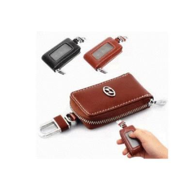 China GENUINE LEATHER car key bag customized promotional leather car brand gifts car holder fashion for sale