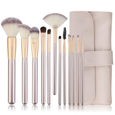 China Angular Blush Free Sample Professional Design Wood Handle 12 PCS Luxury Makeup Brush Set With Case for sale