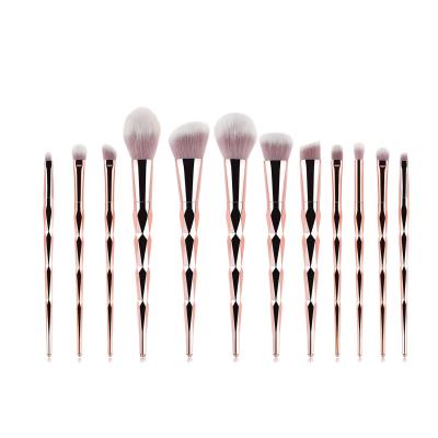 China Angular Blush New Style Professional Cosmetic Brushes 12pcs Customized Logo Makeup Brush Set for sale