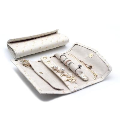 China Newest Cute Beige Genuine Leather Jewellery Pouch Fancy Luxury  Travel Organiser Leather Jewelry Case Roll for sale