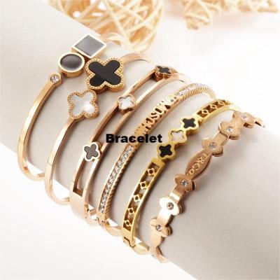 China FASHIONABLE Open Hot Sale Gold Stainless Steel Bangle Four Leaf Clover Bangle Cuff Bangle For Women And Girls Gold Plated Zircon for sale