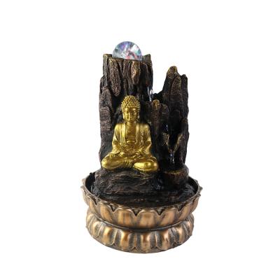 China Asian Zen Small Resin Gold Water Fountain Buddha Water Table Desktop Feature with Lotus Base for sale