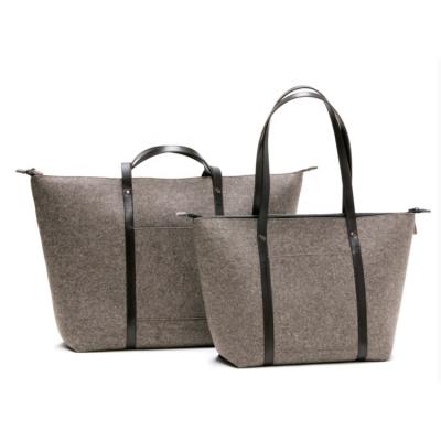 China Large Capacity Handbag Leather Handled Tote Bag Handle Felt Traveling Bag With Zipper for sale