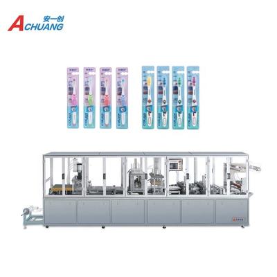 China New Automatic Plastic Products Paper Blister Thermoforming Heat Sealing Packaging Machine For Toothbrush for sale