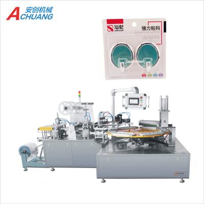 China Semi Automatic Commodity Hook Blister Card Adhesive Packing Machine for sale