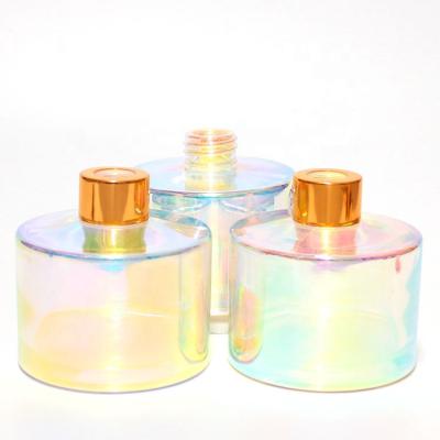 China Luxury empty iridescents customize luxury new design empty iridescent glass tubular diffuser bottle for home decoration for sale