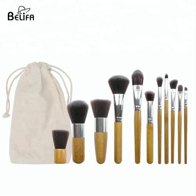 China wholesale cheap vegan 11 piece kabuki bamboo handle makeup brush set for custom logo factory, Cosmetic brushes travel kit en venta