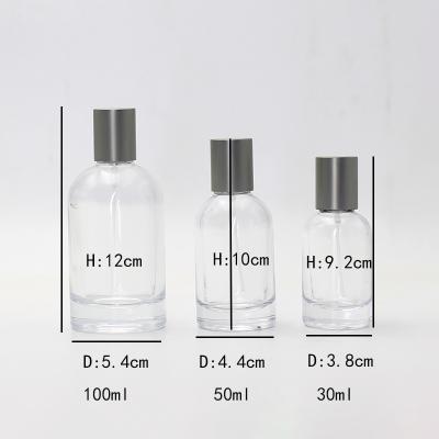 China Supplier 30ml 50ML 100ml Cosmetic Round Perfume Bottle Perfume Bottle Transparent Press Perfume Spout for sale