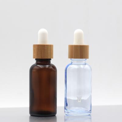 China 5ml 10ml 15ml 30ml 50ml 100ml 120ml Cosmetic Amber Glass Dropper Bottles Essential Oil Bottle Beard Oil Dropper Bottle With Bamboo Cap for sale