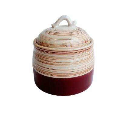 China Sustainable Novelty Handcrafted Small Two Tone Assorted Colors Colorful Ceramic Kitchen Airtight Seal Stoneware Storage Jars for sale