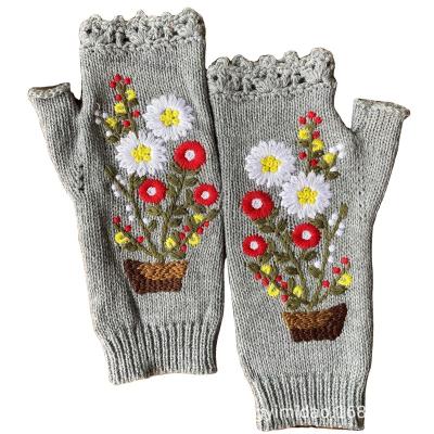 China Small safflower autumn and winter woolen knitted gloves women's long warm adult women's comfortable gloves for sale