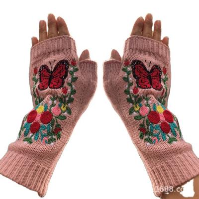 China The comfortable border gloves of the long warm adult women's gloves butterfly flowers autumn and winter wool knitted women's gloves for sale