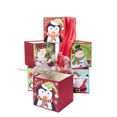 China Manufacturer Wholesale Cartoon Printing Rectangle Folding Foldable Christmas Cloth Storage Box Storage Box Durable Organizer for sale