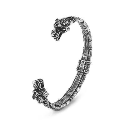 China Pagan Jewelry Viking Arm Ring Stainless Steel Wolf Head Braided Torc Bracelet Wolf Wristband norse norse jewelry for sale