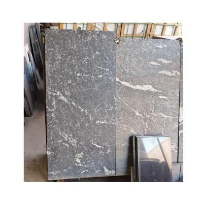 China Modern Chinese nero nuvolato granite tiles in honed finish for sale