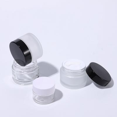 China 50g 5g 100g 30g 10g 10ml 1oz Small Facial 50g Facial Cosmetic Bottle White Black Gold Round Amber Clear Cosmetic Cream Glass Empty Frosted Jar for sale