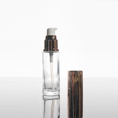 China Cheap Custom Medium Penetration Cosmetic Hot Selling Lotion Pump Glass Bottle for sale