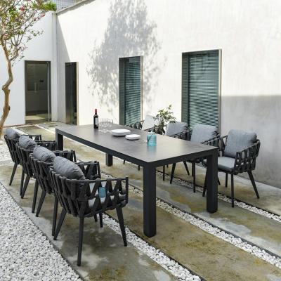 China Modern Outdoor Aluminum Frame Dining Table 240cm Long Table Top Slab Luxury Rock Table With 6 Or 8 Waterproof Chairs for sale