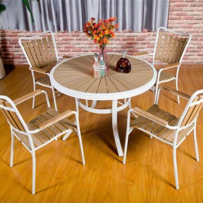 China Modern plastic wood aluminum frame white bakelite color waterproof chair and table set for outdoor indoor furniture dia106x74cm for sale