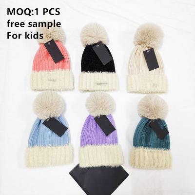 China LOGO Brand Knitted Beanie Adults Custom Free Samples Kids Winter Hats Fur Ball Pom Pom Beanies Hat COMMON for sale