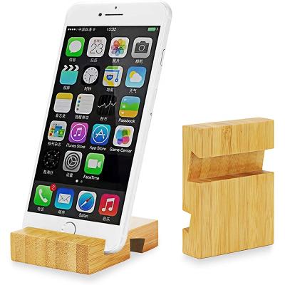 China 2 Piece Portable Cell Phone Stand Holder Natural Bamboo Wooden Phone Dock Stands for Most Smartphones and Tablets for sale