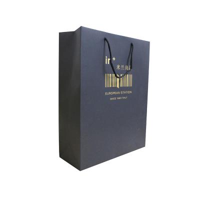 China Recyclable Custom Gold Stamping Rope Handle Paper Handbag for sale