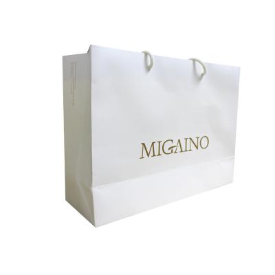 China Recyclable Custom Unique Color Print Gift Commercial Luxury Shopping Paper Bags for sale