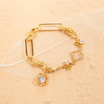 China 2022 FASHIONABLE hot luxury brand 18k real clover zircon gold plated thick chains bracelets for women jewelry for sale