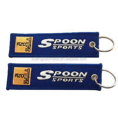 China Durable Cut Border Heat Key Chain Embroidered Embroidery Patches Keytag Souvenir Sports Keychains for sale