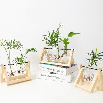 China Plant Eco-friendly Mini Greenhouse With Wood Stand, Swivel Glass Stand Metal Retro Air Planter Bulb Vase Table Top for sale