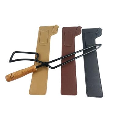 China Factory direct sales easily cleaned outdoor camping portable handle camping charcoal clip with leather for sale