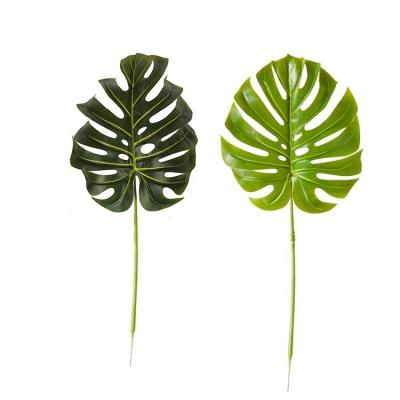 China MOQ is 144 pcs Artificial Christmas Decoration Leaf Plant Artificial Fake Leaves Green Plastic Foliage for sale