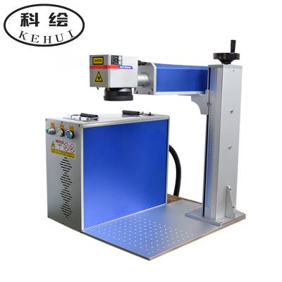 China Liaocheng Factory New Model 20w Raycus Air-cooled Fiber Laser Source Laser Marking Machine Working Size 200*200mm for sale