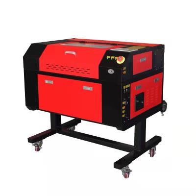 China Water Cooling Kehui 3050 CO2 Laser Engraving Cutting Machine Used 50w Laser Tube for sale