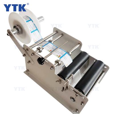 China YTK-L100 Manual Food Hand Operate Round Bottle Labeling Machine Semi Automatic Bottle Labeling Machine for sale