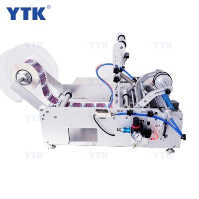 China YTK-190 food labeling machine round jars roll to roll label printer machine 10ml bottle labeling machine for sale