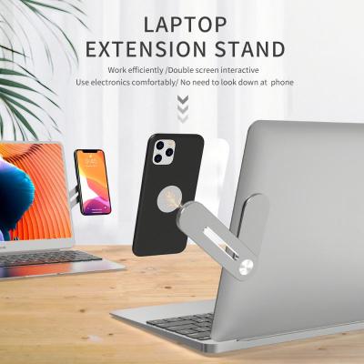 China Universal Phone Computer Expansion 2020 Newest Mobile Phone Suction Bracket Laptop Stand Universal Magnetic Magnetic Phone Holder for sale