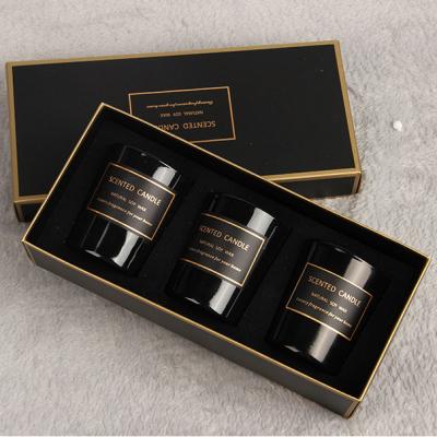 China Custom Wax Luxury Black Glass Aroma Soy Jar Scented Amazon Logo Candle Jar Decoration Gift Set for sale