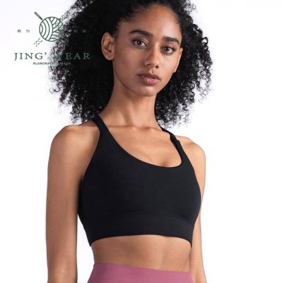 China Innovation Breathable Edge Fabric Nudity Good Quality Sports Female Yoga Bra Tops for sale