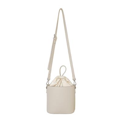 China All-match multi-function simple handbag style PU spring bucket shoulder nylon cross-body splicing bag for sale