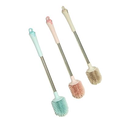 China Stocked Creative Punch Free Wall Mounted Sillicone Ball Cleaning Brush PP Material Soft Toilet Brush for sale