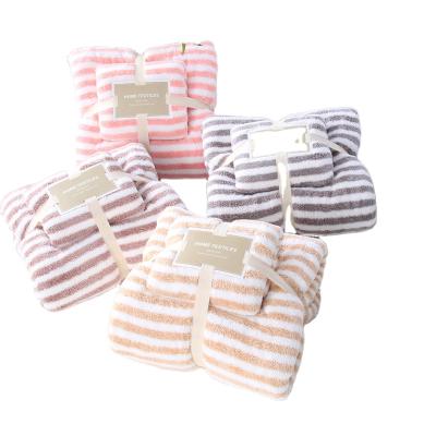 China High Density Folded Blankets Vertical Stripes Coral Velvet Towels Thick Gift Towel Fleece Blanket for sale