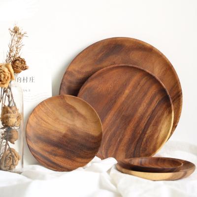 China Viable a variety of solid acacia wood round dish unpainted cake dessert dish wooden dried fruit fruit dish for sale