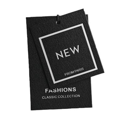 China Sustainable Environmental Friendly Custom Embossed Tan Card Clothing Tag Recycled Paper Black Label for sale